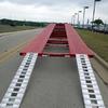 Aluminum 7'5" 7K ramps secure easily into the back locks on the trailer.  The low angle of attack allows even low vehicles to be loaded without damage.